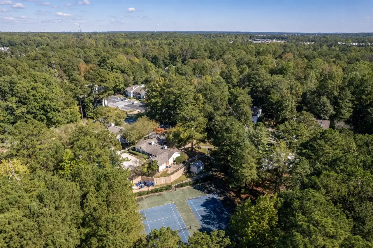 Aerial view of The Woods at Shannon Lake among the trees